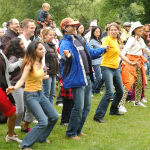 People dancing at a park event