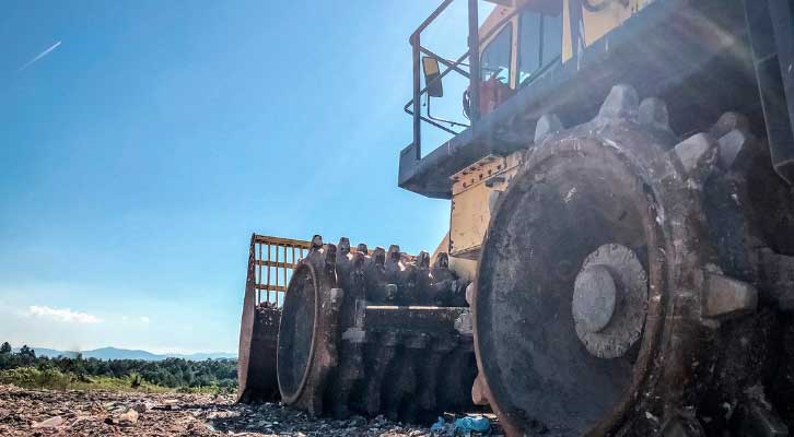 Bulldozer in landfill