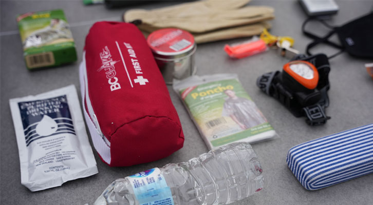 VEMA supplies: water, first aid kit, poncho