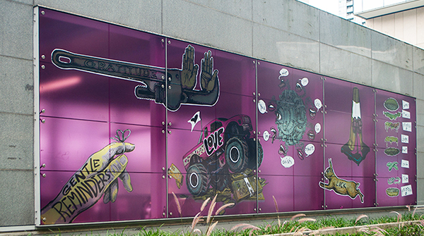 Gentle Reminders by Cheryl Hamilton, with surreal illustrations on a magenta wall at City Centre Station.