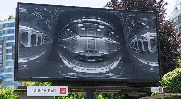 Artist Maggie Wong's artwork "Untitled Shrine (Neutrality)", a black and white mirrored image, on a billboard