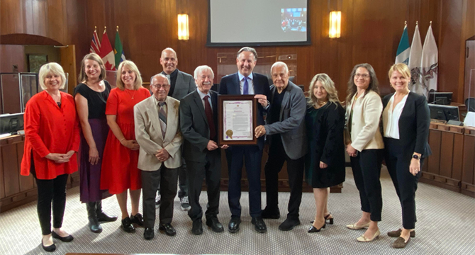 City Council standing with Italian community members