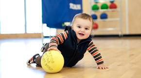 Baby playing with ball