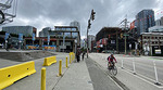 Cyclist riding on protected bike lane on Beatty Street