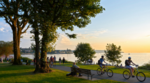 Cyclists biking along a trail