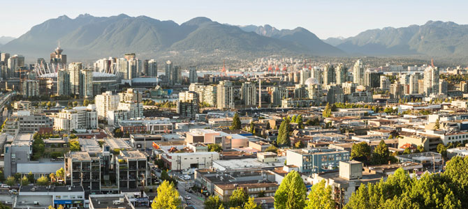 Broadway with a view of downtown and the North Shore mountains Broadway with a view of downtown and the North Shore mountains