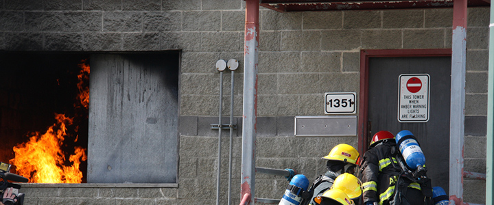 Fire crews attending building fire Fire crews attending building fire