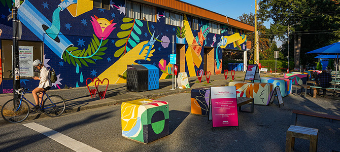 People gather at a vibrant public plaza off Cambie street