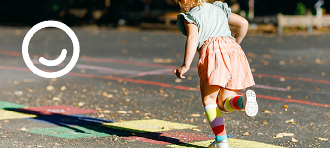 Child playing hopscotch