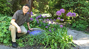 https://vancouver.ca/images/cov/feature/chris-hay-with-stanley-park-rock-garden-plaque.jpg