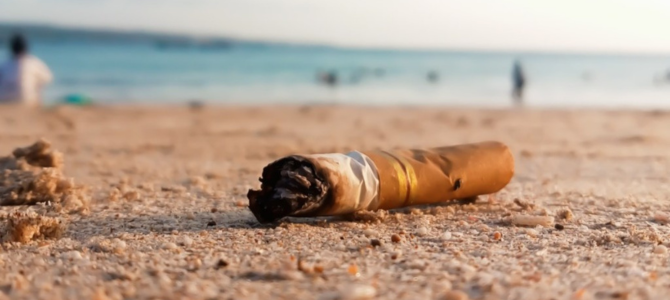 Cigarette butt on a beach