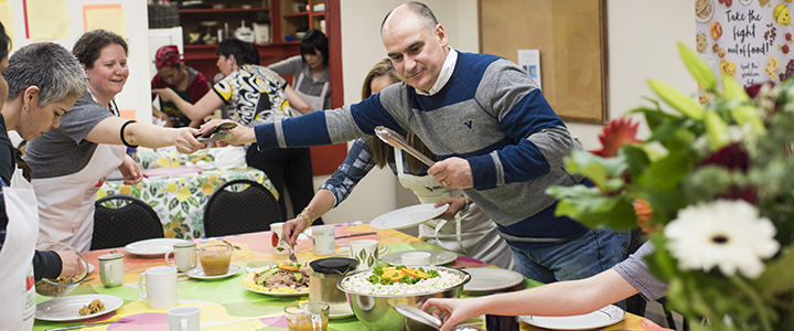 People in a community kitchen