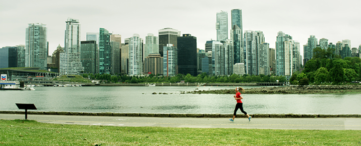 Person running on the seawall