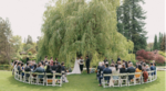 Outdoor wedding ceremony at Heron Lake in VanDusen Botanical Garden.