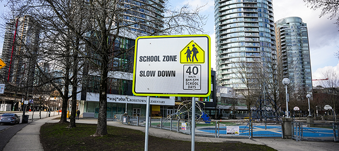 A school zone sign outside Crosstown Elementary