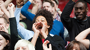 People cheering at an event