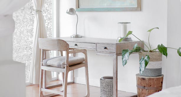 Desk and chair in a room Desk and chair in a room