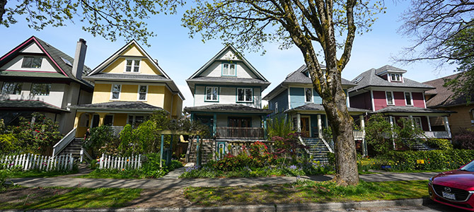 Detached homes in a row on a street