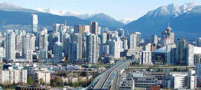 Downtown Vancouver buildings and Cambie Bridge