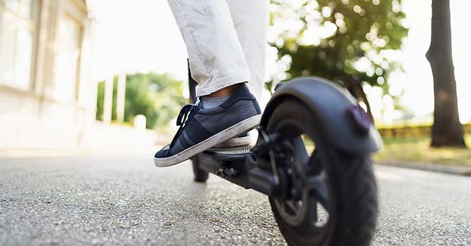 Person riding an electric scooter