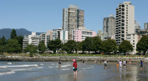 People on the shore of English Bay People on the shore of English Bay