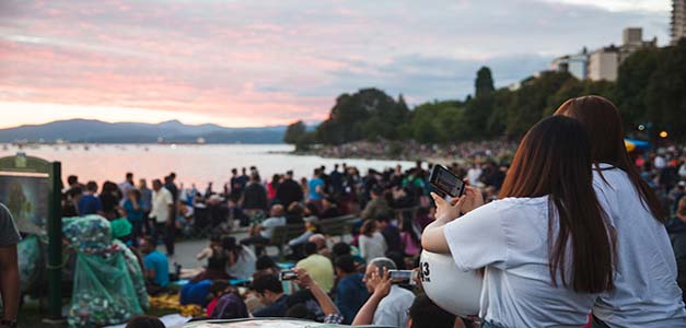 A large crowd gathered at English Bay beach