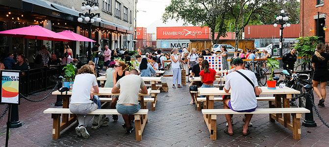 Picnic benches in a Gastown outdoor patio