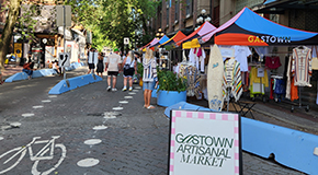 People browsing a festival in Vancouver's Gastown