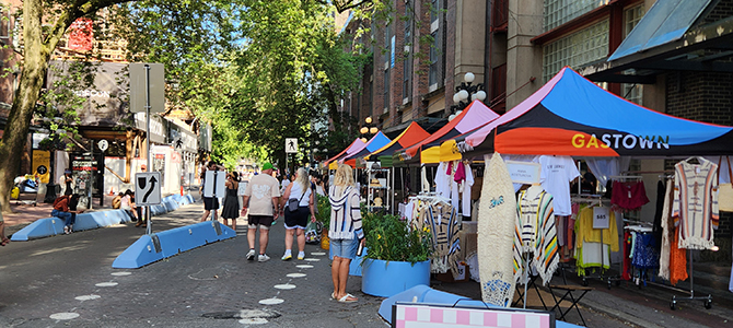 People browsing a festival in Vancouver's Gastown People browsing a festival in Vancouver's Gastown