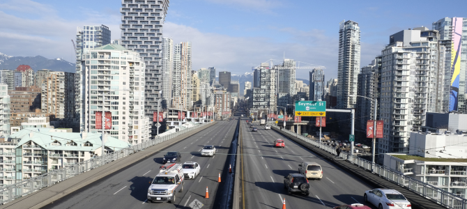 Cars driving down Granville Bridge