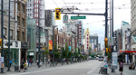vehicles and people along Granville Street vehicles and people along Granville Street