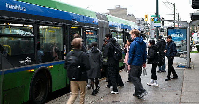 People entering a bus