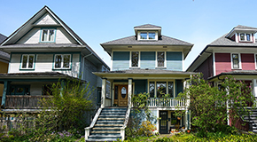 Heritages houses on a residential street.