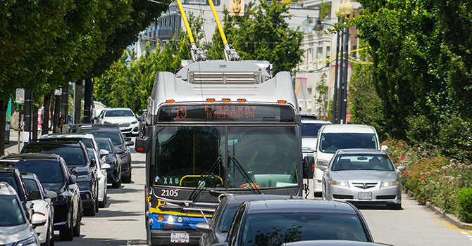 Transit bus driving down Kingsway Transit bus driving down Kingsway