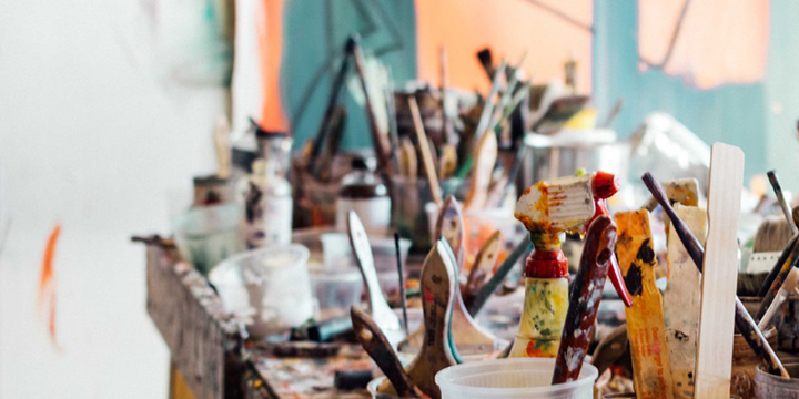 Artist work table with brushes