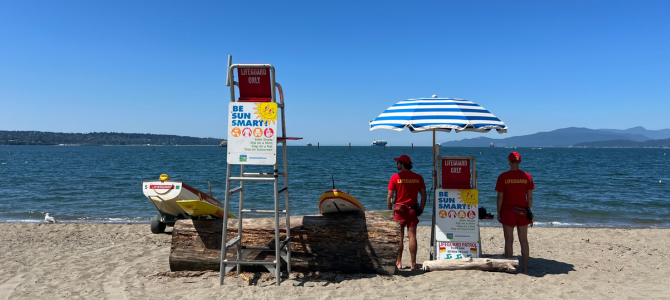 Lifeguards watching the ocean on a Vancouver beach