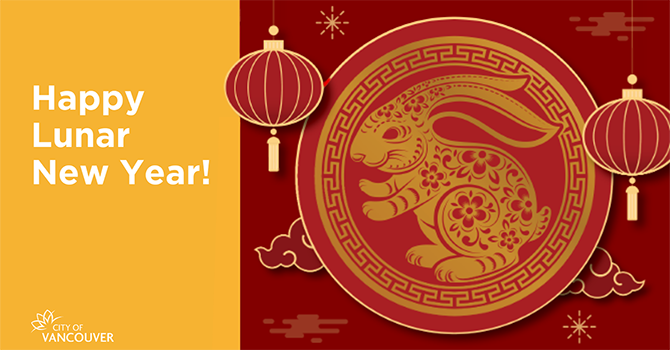 Red and gold poster with Happy Lunar New Year spelled out.