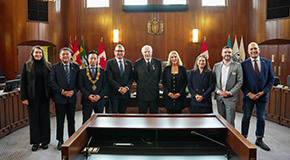 Michael Audain receives with the Freedom of the City Award with the Mayor and Councilors