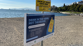 A sign that says drinking is prohibited on Vancouver beaches 