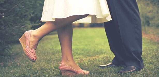 People standing on grass