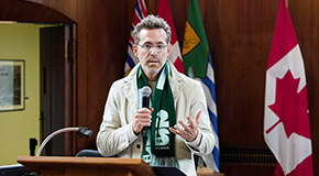 Ryan Reynolds standing at the podium in Council Chambers