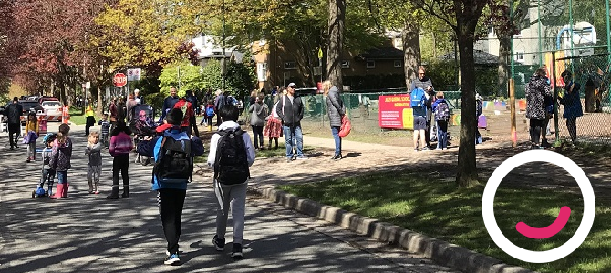 Parents pick up their children from a school on a School Street