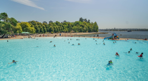Swimmers swimming at Vancouver's Second Beach pool