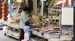 lady and child outside store in Chinatown lady and child outside store in Chinatown