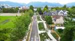 Aerial view of St. George Street with bike lane markings and landscaped sidewalks.