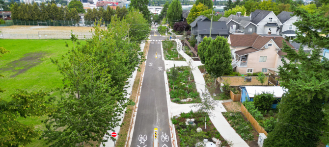 Aerial view of St. George Street with bike lane markings and landscaped sidewalks.