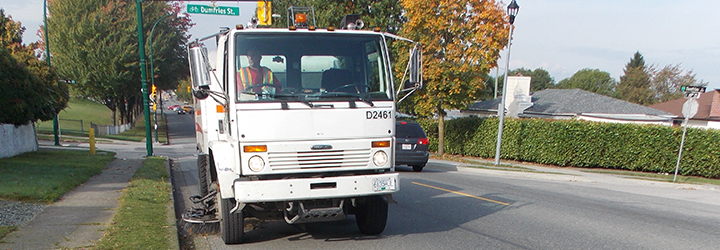 Street sweeper cleaning a Vancouver street