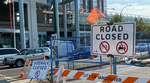 Road closure sign blocking off part of a street