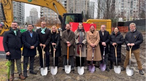 Vancouver City Councilors stand in front of 95 Nelson Street with shovels as construction is underway