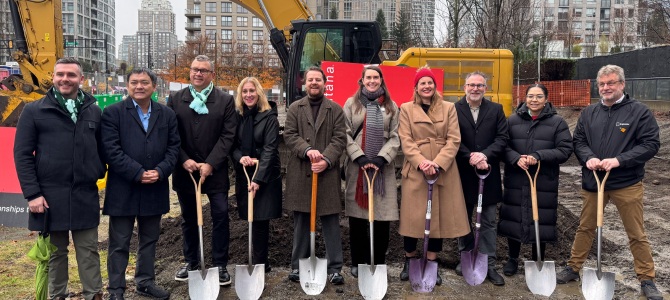 Vancouver City Councilors stand in front of 95 Nelson Street with shovels as construction is underway